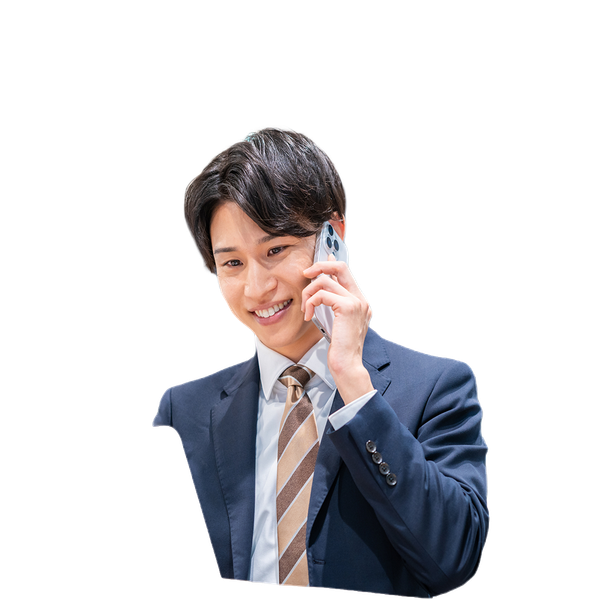 電話で応対する男性のイメージ写真